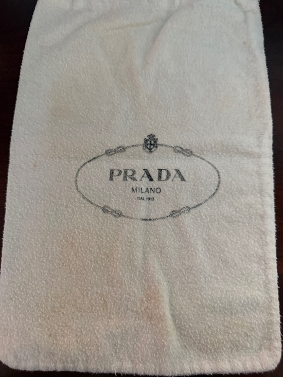Prada Handbags - Prada Drawstring Logo Dust Bag in Ivory and Black Print logo on front.8” X 12.5”